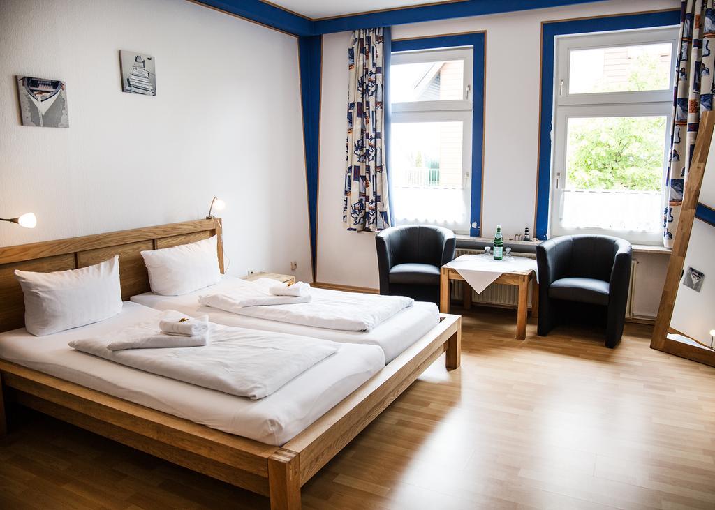 Hotel Tum Stueuermann Бюзум Экстерьер фото