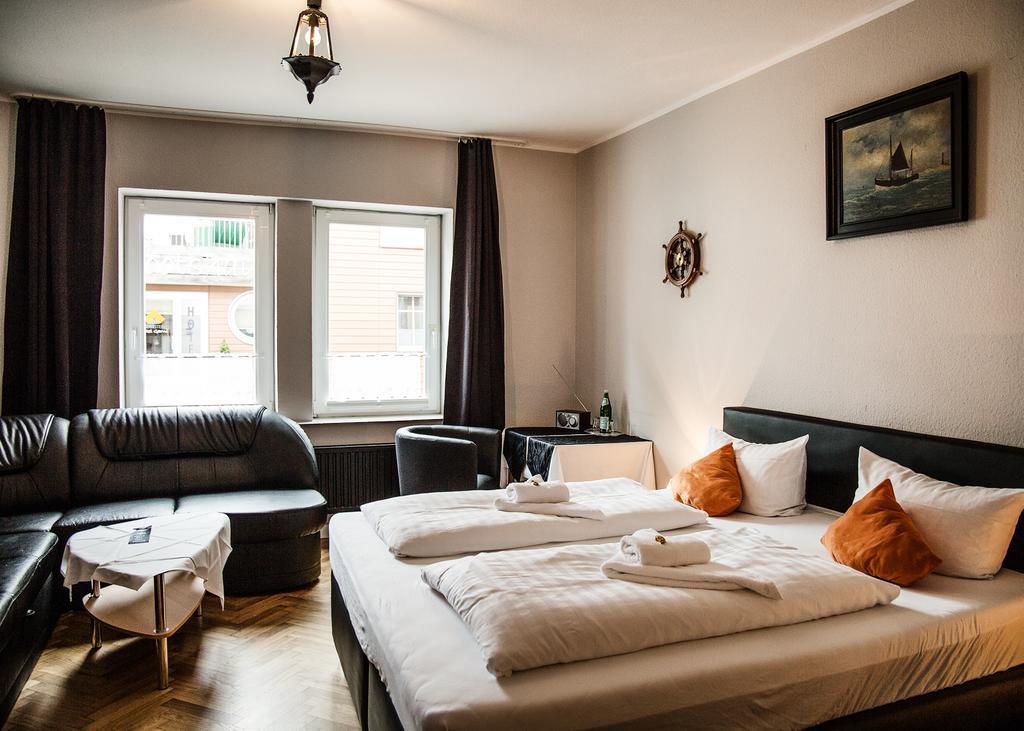 Hotel Tum Stueuermann Бюзум Экстерьер фото