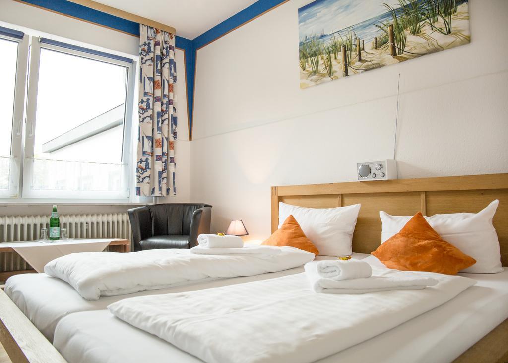 Hotel Tum Stueuermann Бюзум Экстерьер фото