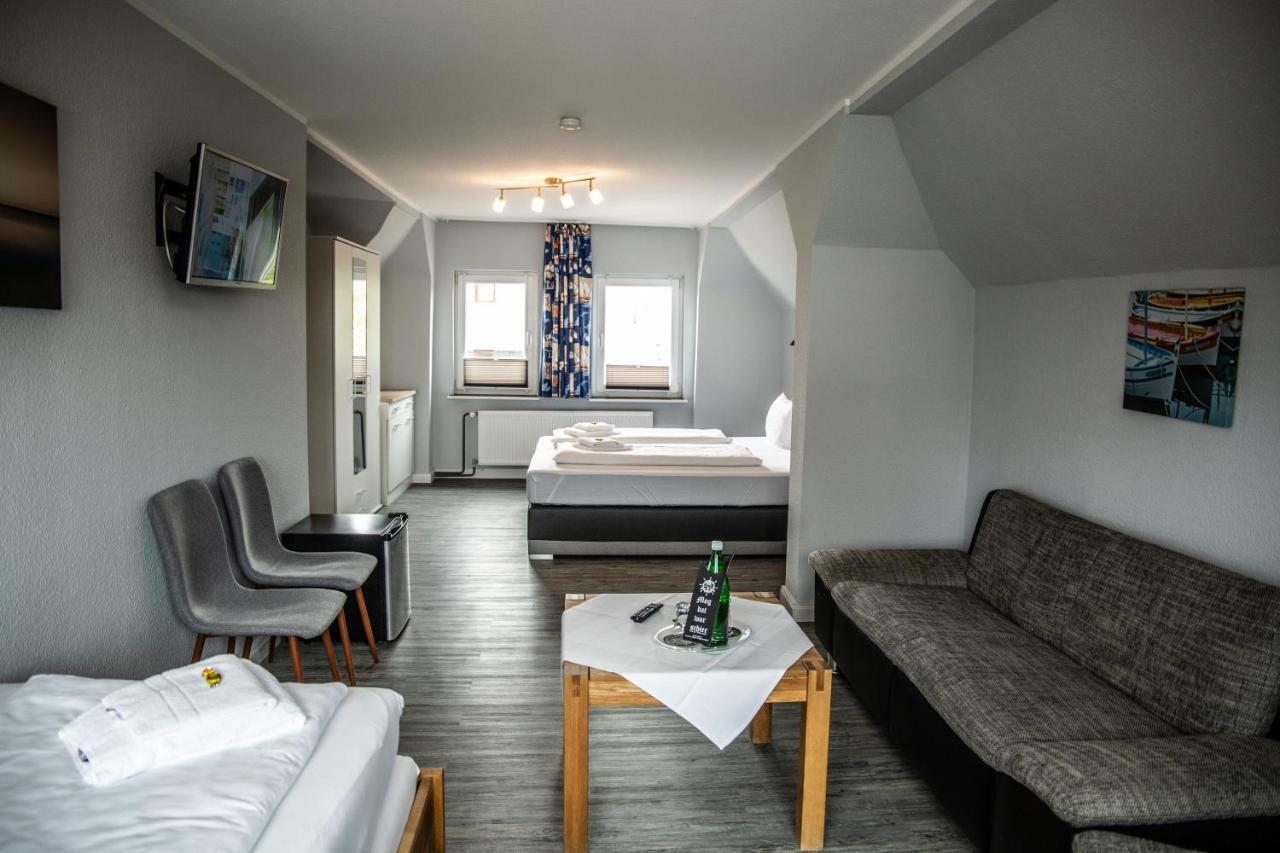 Hotel Tum Stueuermann Бюзум Экстерьер фото